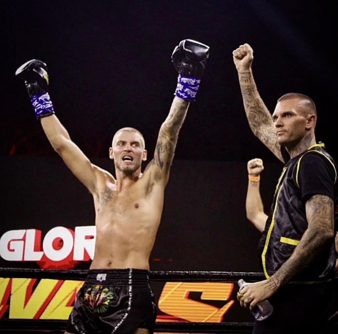 Fight night — arms raised after a win